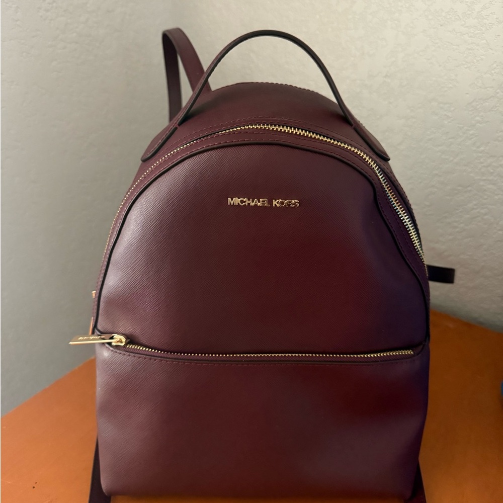 Michael Kors Sheila Wine Red Backpack with Gold Accents
